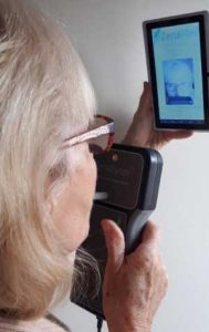 Person using remote hand-held breathalyser