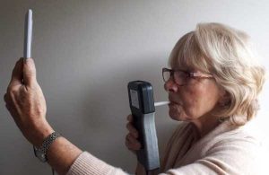 Person using a breathalyser