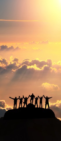 silhouettes on a mountain illustrating recovery