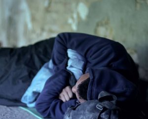 Sleeping homeless person