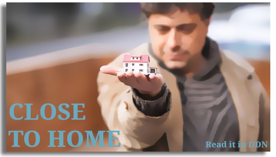 Man holding a small house to demonstrate the housing shortage for people in recovery